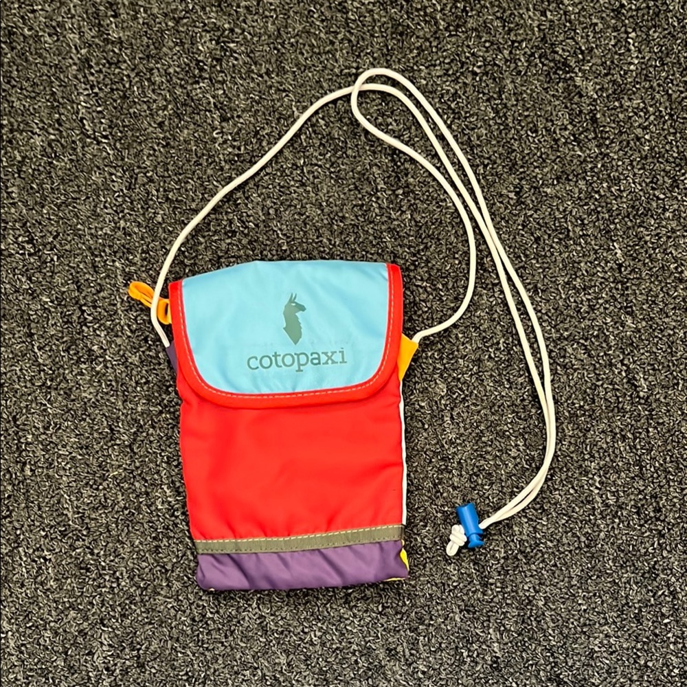 Cotopaxi Red and Blue Crossbody Bag